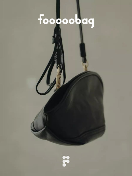 The Shell Bag: Your Sculpted Leather Essential for Effortless Summer Style