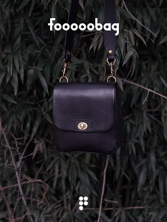 Effortless Edge: Meet the Vintage Latch Tofu Bag, Your Minimalist Leather Essential